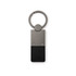 A metal keytag with a rectangular black leather strap and a circular keyring attachment.