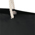 A black beach tote bag with a white rope handle and a silver eyelet. It features a simple, modern design.