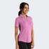 A purple polo shirt for women, featuring a collar and button detail, displayed on a model against a neutral background.