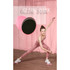 A pink glide disk with a black underside beside a person demonstrating a fitness pose in a pink outfit.
