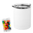 A white coffee mug with a transparent lid alongside a packet of colourful jelly beans.