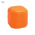 An orange lip balm cube with a smooth, rounded design. It features a logo on the surface.
