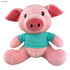 A pink pig plush toy wearing a light blue shirt, featuring big ears and a friendly face. It has a branded tag.