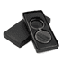 A gunmetal keychain presented in a black gift box, featuring a sleek, circular design.