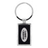 A silver keychain featuring a rectangular design with a black background and a logo.