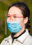 C-Shield of clear plastic  with a sanitary mask