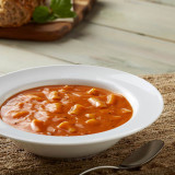 ReadyWise gluten free tomato basil soup served in a white bowl