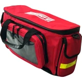 Angle view of the red Deluxe Emergency Kit duffel bag showing side pockets and reflective strips
