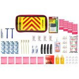 HygienePack contents: toothbrushes, razors, soap, combs, tissues, wipes and hygiene supplies around the red pouch