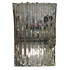 Mylar emergency survival blanket unfolded showing reflective silver surface