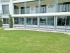 Mako Inflatable Flood Barriers installed across ground-floor doors of a condo building