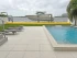 Guppy Water-Filled Flood Tube protecting a waterfront pool deck