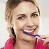 TePe Supreme ToothBrush view of person brushing with the toothbrush