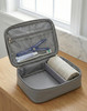 Blue Flossaid floss handle in a travel vanity case