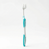 Colgate Wave Ultra-Compact Head Soft Toothbrush, Soft Bristles for Gentle Plaque Removal, Compact Curved Head for Hard-to-Reach Areas and Gumline Cleaning, Manual Toothbrush for Daily Oral Care. View of a toothbrush.