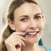 TePe Large 1.1 mm Purple Interdental Brushes person using