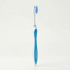 Colgate Wave Gum Comfort Ultra-Soft Compact Toothbrush side view of full toothbrush