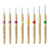 Piksters Variety Pack Bamboo Interdental Brushes – Assorted 8-pack showing eco-friendly bamboo handles with soft bristles in multiple sizes for effective plaque removal and cleaning between teeth, braces, and dental appliances. Photo of all eight brush next to each other