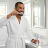 Colgate Gel-Kam 0.4% Stannous Fluoride Gel - Fruit and Berry Flavor - 4.3 oz Tube - At-Home Dental Care view of a man brushing his teeth