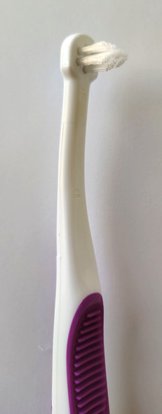 GUM® End-Tufted 308 Toothbrush view of brush head and partial view of the handle