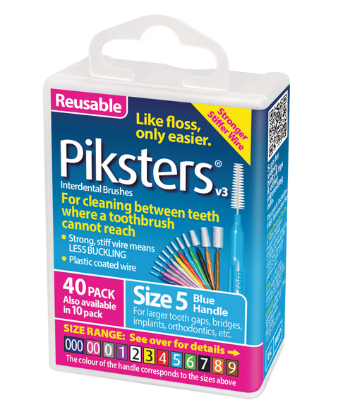Photo of a Piksters Blue Size 5 interdental brush 40-pack, showing individual blue-handled brushes with bristled tips, neatly arranged in a transparent plastic case with product branding visible.