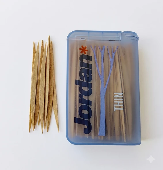 Jordan Dental Wooden Sticks - Mint Flavored - Thin Size - view of the package and several dental sticks next to it.