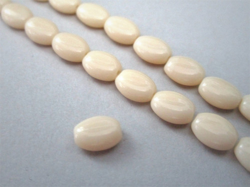 Opaque beige 8x6mm flat oval Czech beads