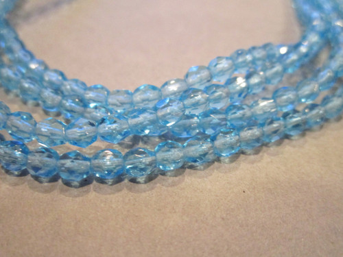 Aqua blue 4mm faceted round Czech glass beads