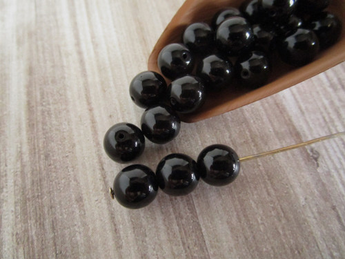 Jet black 8mm round druk Czech glass beads