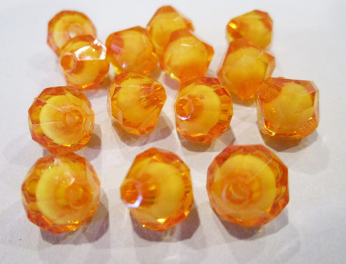 Orange 10mm faceted bicone acrylic bead in a bead