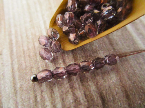 Purple 3mm faceted round Czech beads