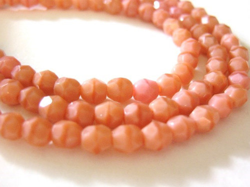 Opaque pink 4mm faceted round Czech glass beads