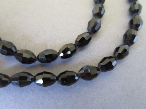 Black 8x6mm faceted oval glass beads