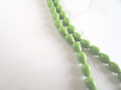 Opaque green 11x8mm teardrop glass beads