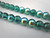 Transparent teal ab 8mm round druk Czech beads