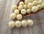 Opaque beige 6mm round druk Czech glass beads