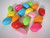 Opaque assorted 9x13mm twisted oval acrylic beads