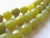 Olive jade faceted round gemstone bead