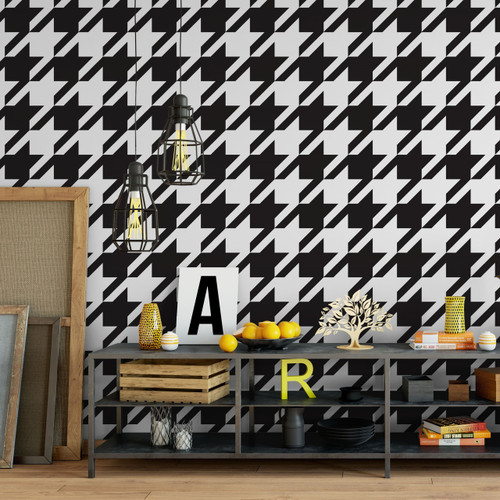 small table with removable houndstooth wall covering on the wall