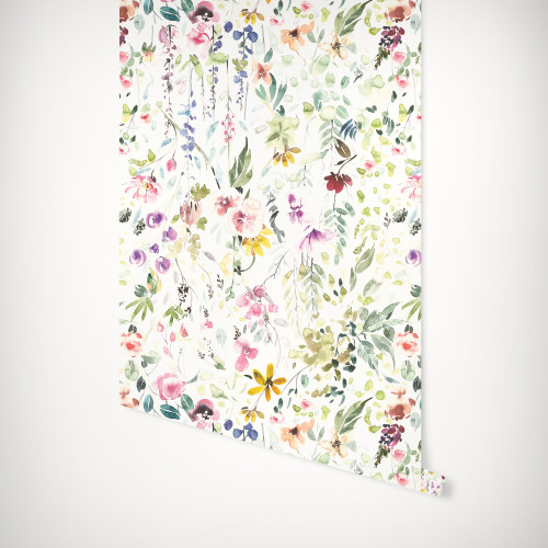 Eden Floral Peel and Stick Wallpaper by Paperbird Home with vibrant botanical blooms and lush greenery, creating a garden-inspired accent wall in a powder room.