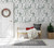 Entryway with watercolor pine forest wallpaper and christmas decor