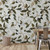 Southern Magnolia Flowers Peel and Stick Wallpaper by Paperbird Home featuring large white blooms and green leaves, perfect for the coastal farmhouse bathroom or bedroom feel.