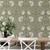 William Morris Pimpernel Peel and Stick Wallpaper by Paperbird Home in vintage sage green and cream, ideal for a maximalist home office or a traditional moody study.