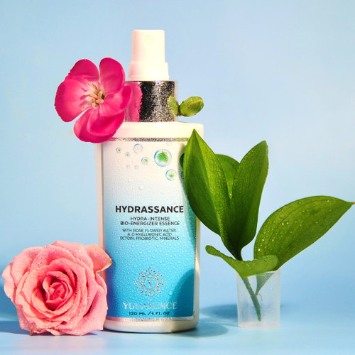 Optimize your skin's hydration and energy on the go with Hydrassance Essence. This ultra-concentrated formula instantly moisturizes and energizes the skin, leaving it soft, radiant, and comfortable. With a blend of Rose flower water, Hyaluronic Acid, Probiotic isolates, and Minerals, it maximizes hydration, protects the skin, and reduces fine lines. It also supports a healthy skin microbiome and provides anti-pollution and blue light protection. Use it before treatment or to set your makeup for a perfect finish.