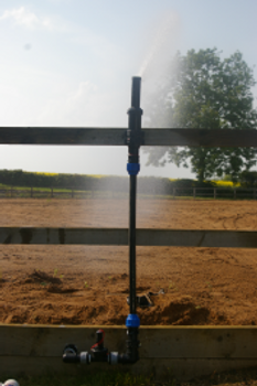 Outdoor riding arena irrigation