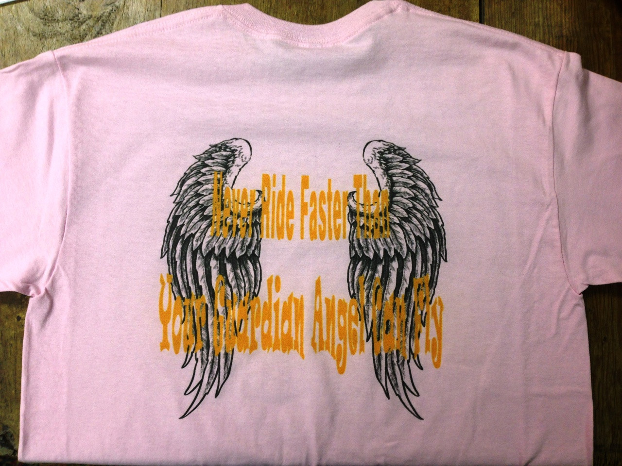 Never Ride Faster Than Your Guardian Angel Can Fly. Biker T-Shirt and