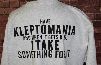 I HAVE KLEPTOMANIA AND WHEN IT GETS BAD, I TAKE SOMETHING FOR IT ON A GRAY SHIRT I HAVE KLEPTOMANIA AND WHEN IT GETS BAD, I TAKE SOMETHING FOR IT ON A GRAY SHIRT