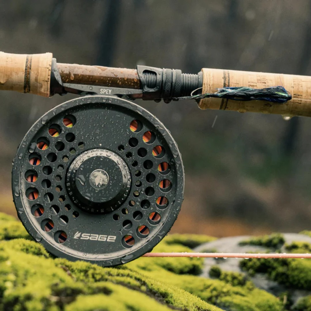 Fly rod reel seat hardware hand engraved