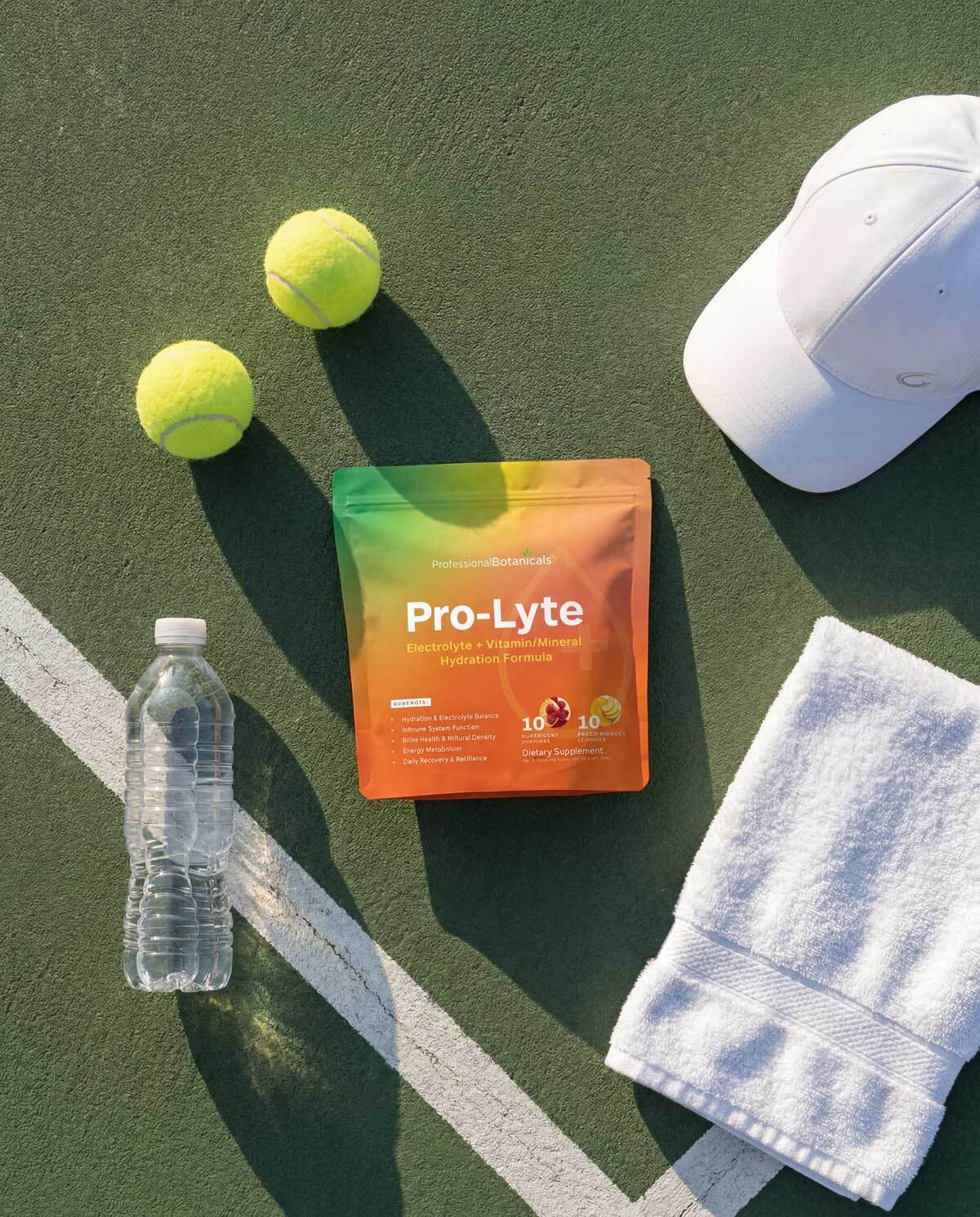 Pro-Lyte stick packs beside tennis equipment