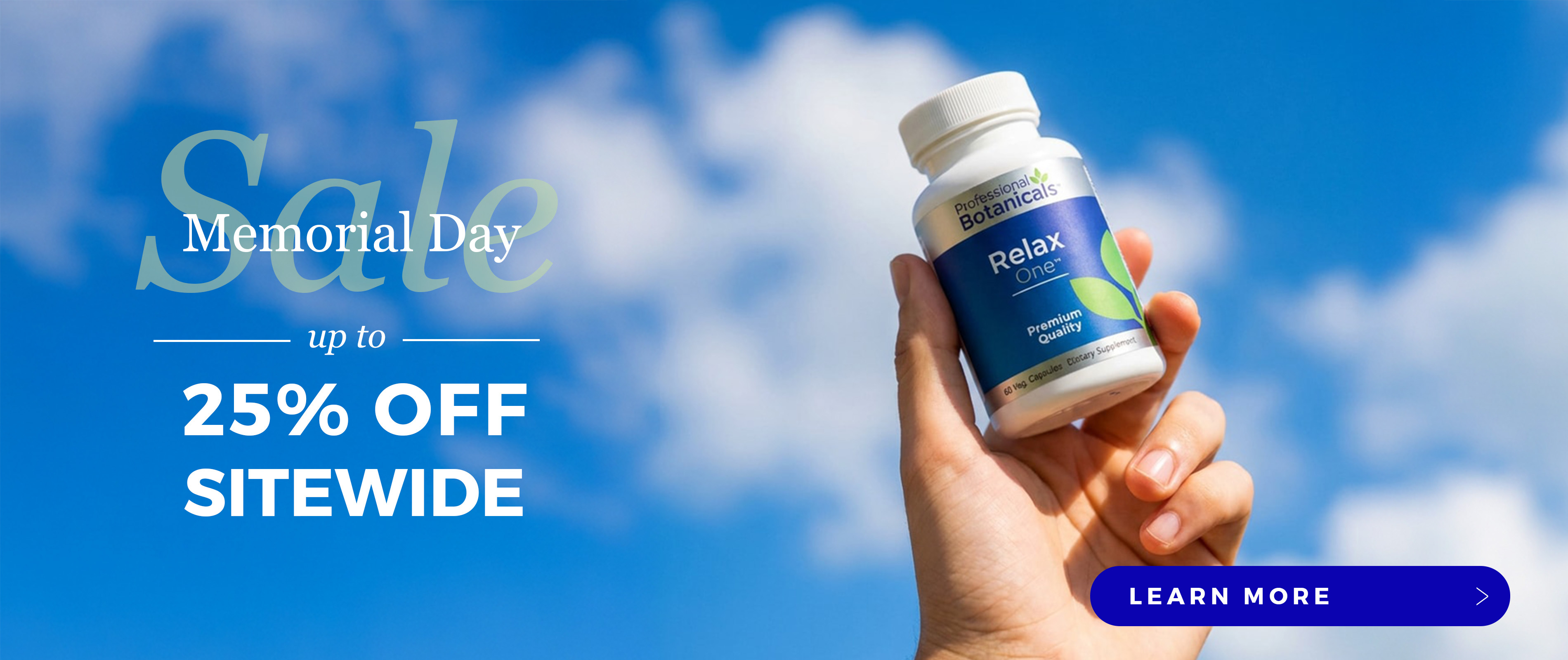 hand holding a bottle of supplements
